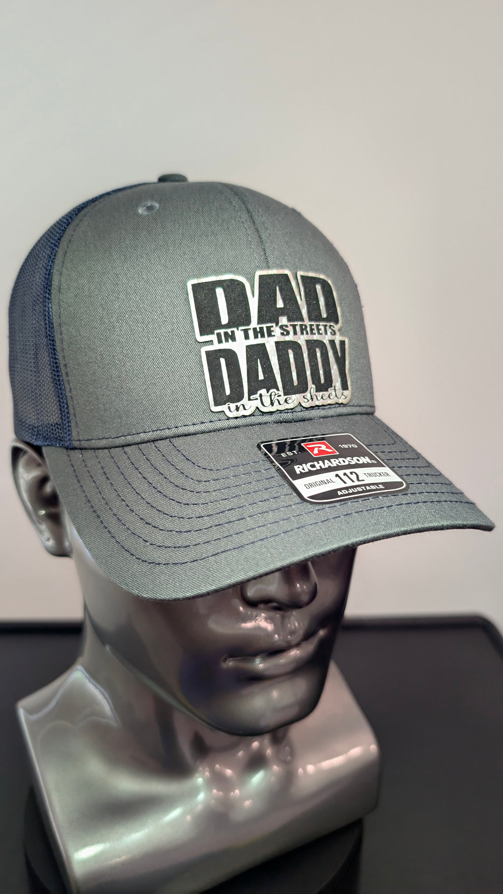 Funny Dad Richardson 112 Hat  “Dad In The Streets Daddy In The Sheets” Silver Carbon Fiber Leather Patch Trucker Hat