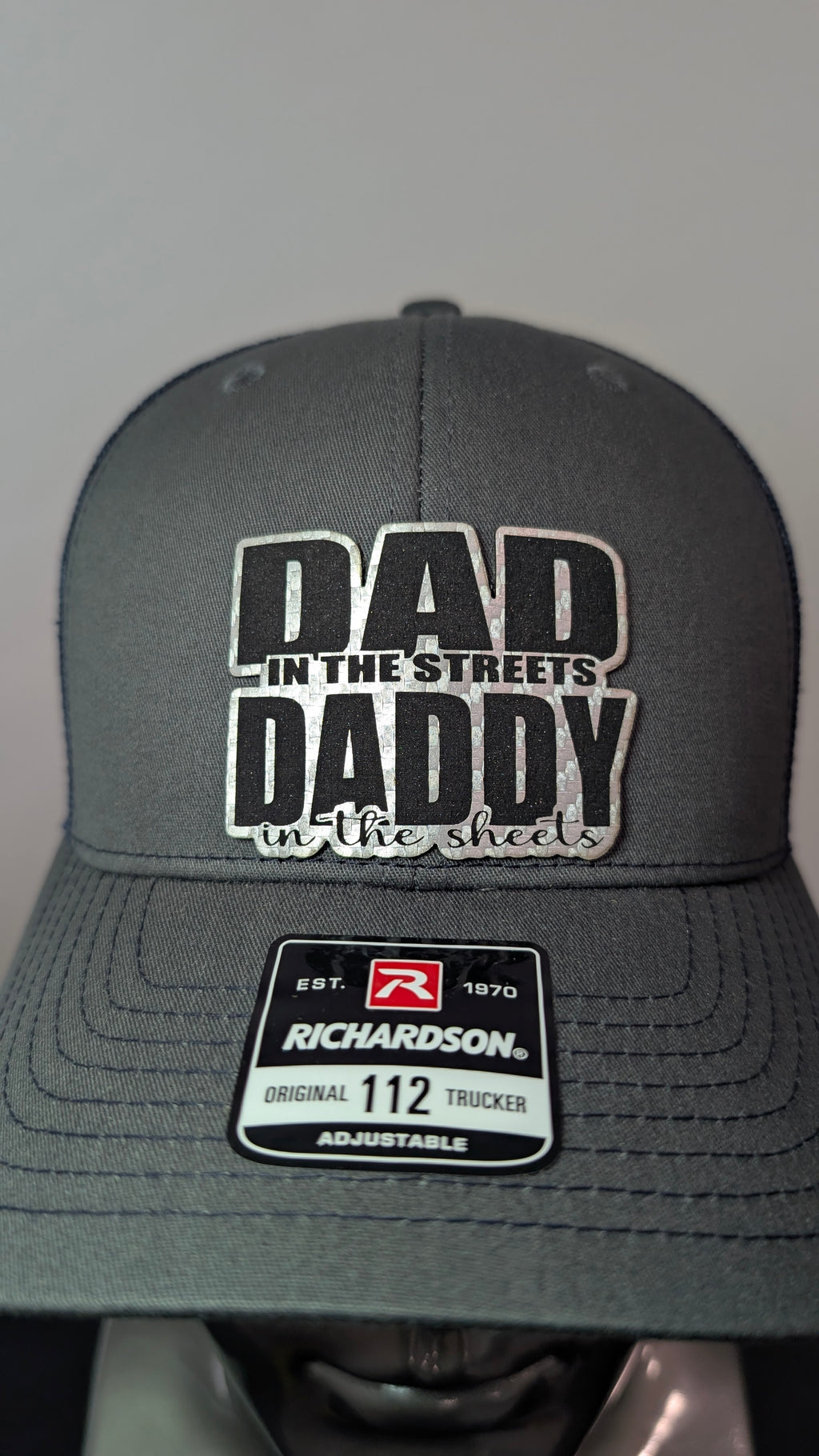 Funny Dad Richardson 112 Hat  “Dad In The Streets Daddy In The Sheets” Silver Carbon Fiber Leather Patch Trucker Hat