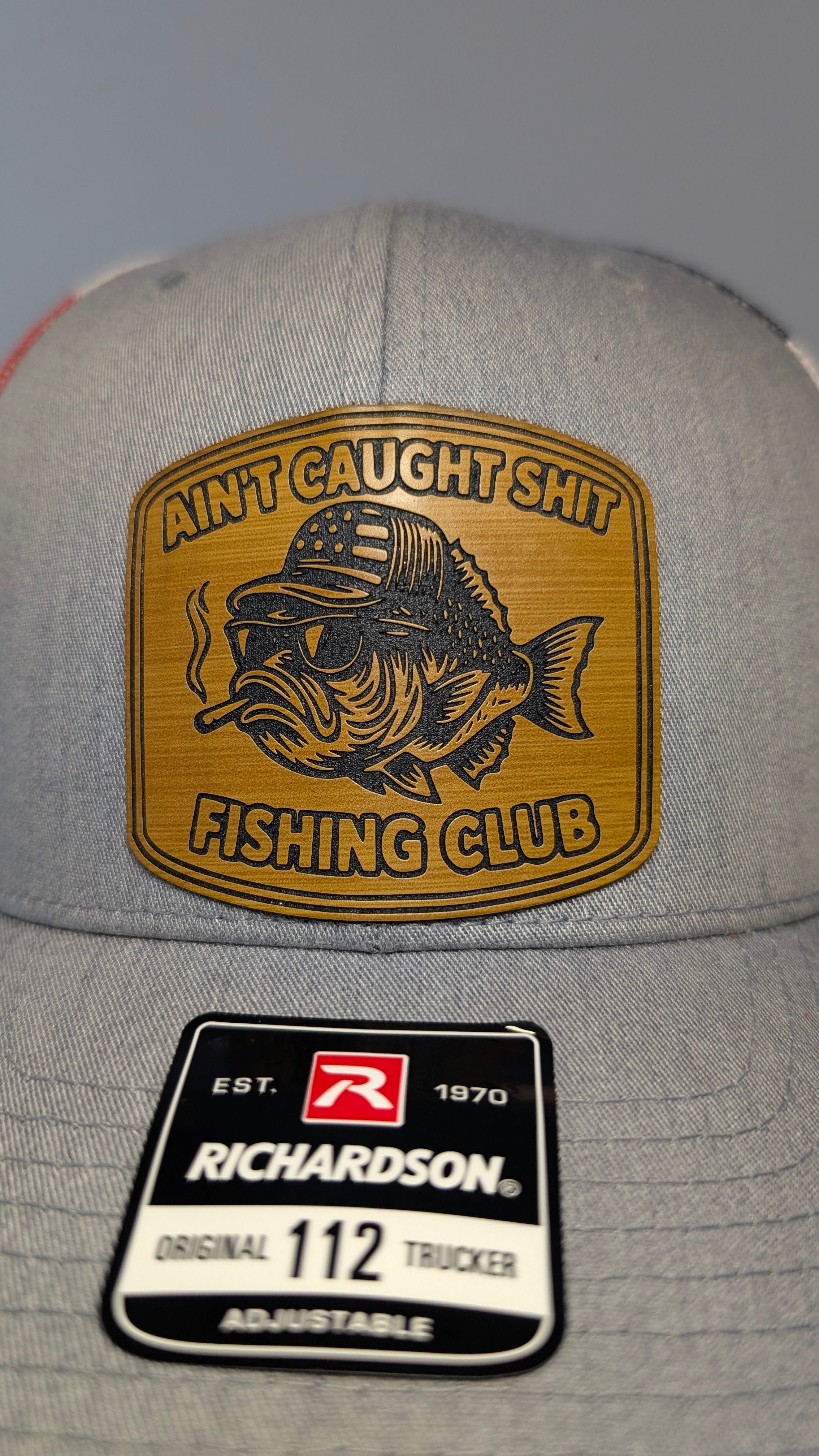 Funny Fishing Richardson 112 Hat  “Ain’t Caught Shit Fishing Club” Leather Patch American Flag Mesh Trucker Cap Fisherman Gift
